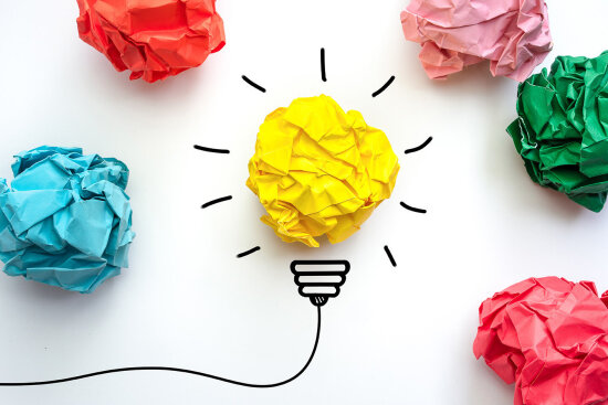 Creative idea, Inspiration, New idea and Innovation concept with Crumpled Paper light bulb on white background.
